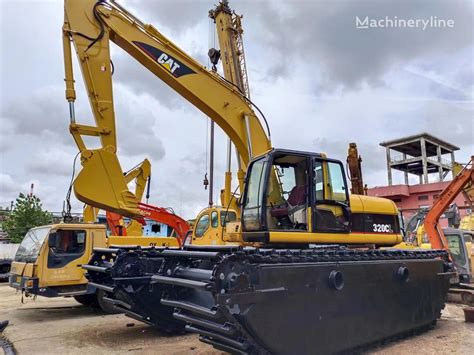 Used Amphibious Excavators for sale. Caterpillar equipment